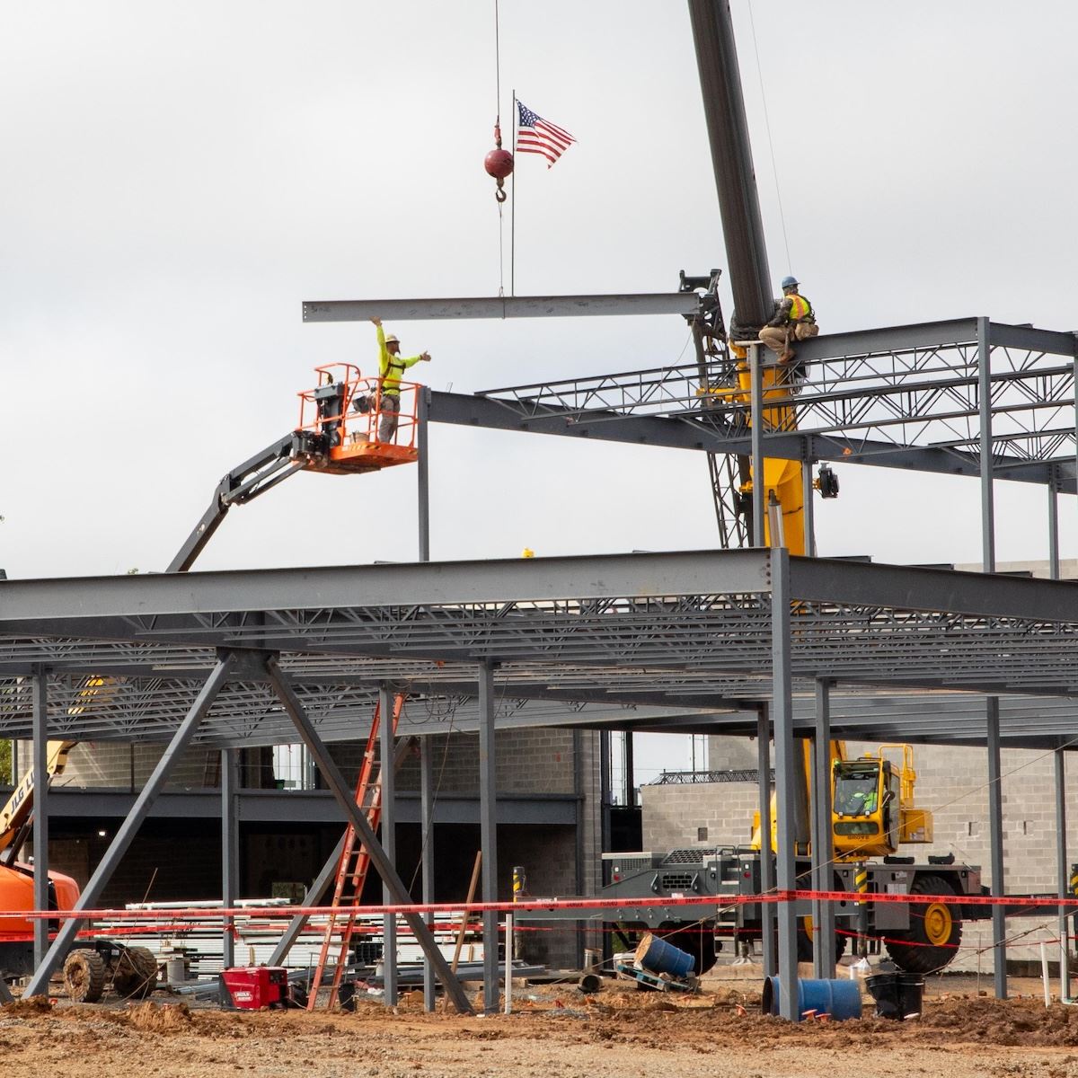  Crews raise the final structural beam at the new Pleasant Plains Elementary School